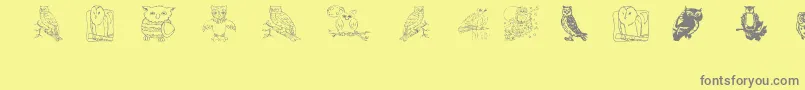 Aez Owls For Traci-Schriftart – Graue Schriften auf gelbem Hintergrund