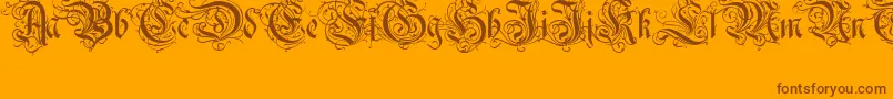 Ruritania-Schriftart – Braune Schriften auf orangefarbenem Hintergrund
