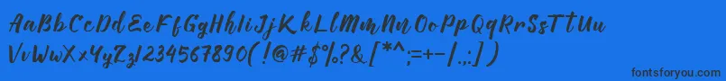 Manttes Font – Black Fonts on Blue Background