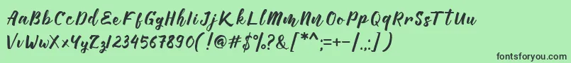 Manttes Font – Black Fonts on Green Background