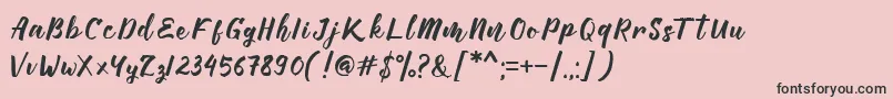 Manttes Font – Black Fonts on Pink Background