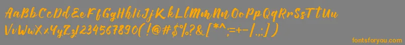Manttes Font – Orange Fonts on Gray Background
