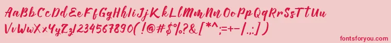 フォントManttes – ピンクの背景に赤い文字