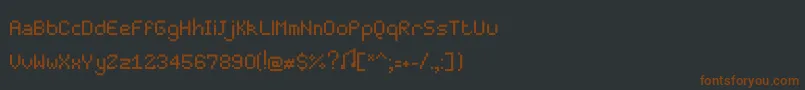 Fonte Pixelmaster – fontes marrons em um fundo preto