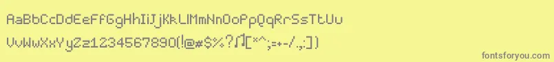 Czcionka Pixelmaster – szare czcionki na żółtym tle