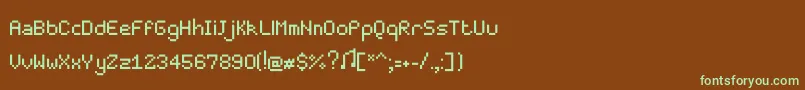 Fonte Pixelmaster – fontes verdes em um fundo marrom