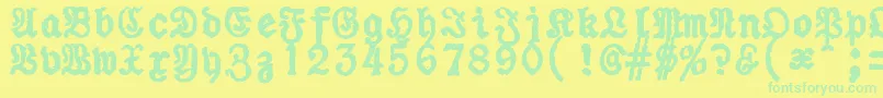 フォントZaiUraniapiccolatypewriter – 黄色い背景に緑の文字