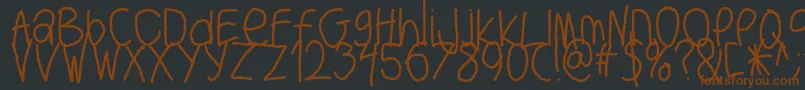 Bigwriter-fontti – ruskeat fontit mustalla taustalla