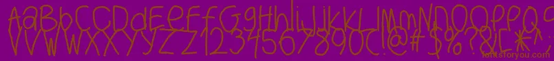 フォントBigwriter – 紫色の背景に茶色のフォント