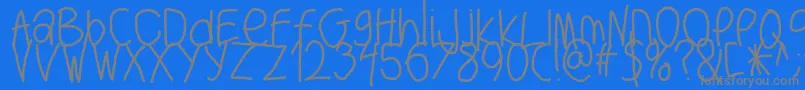 フォントBigwriter – 青い背景に灰色の文字