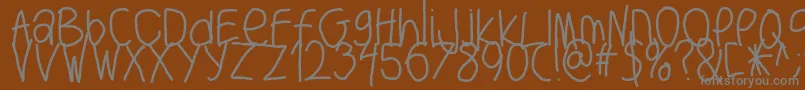 Шрифт Bigwriter – серые шрифты на коричневом фоне