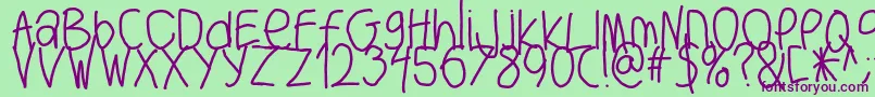 フォントBigwriter – 緑の背景に紫のフォント