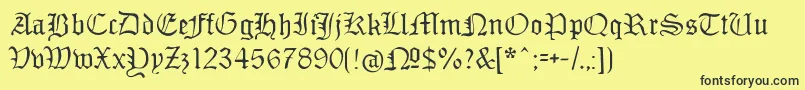 Monamourfraktur Font – Black Fonts on Yellow Background