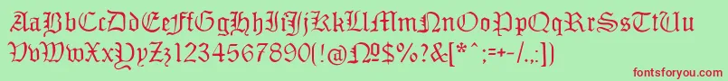 Monamourfraktur-Schriftart – Rote Schriften auf grünem Hintergrund