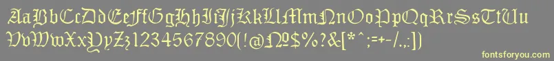 Monamourfraktur Font – Yellow Fonts on Gray Background