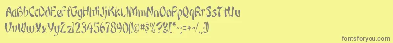 Fonte OrientnarrowRegular – fontes cinzas em um fundo amarelo