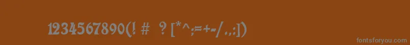 フォントCharlotaNouveau – 茶色の背景に灰色の文字