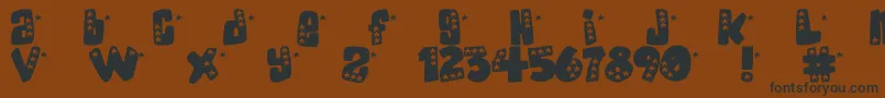 AmericanDonuts Font – Black Fonts on Brown Background