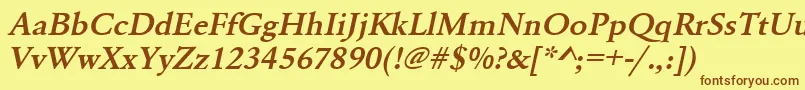 フォントUrwgaramondtdemwidOblique – 茶色の文字が黄色の背景にあります。