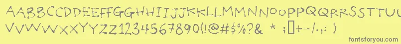 フォントPoilet – 黄色の背景に灰色の文字