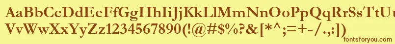 フォントGarabd – 茶色の文字が黄色の背景にあります。