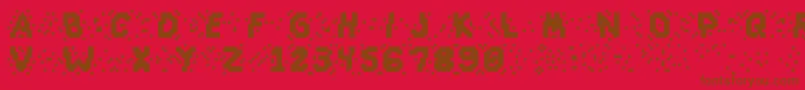 Slapandcrumblyal-Schriftart – Braune Schriften auf rotem Hintergrund