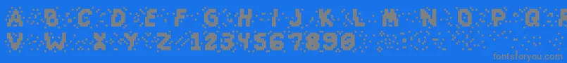 フォントSlapandcrumblyal – 青い背景に灰色の文字