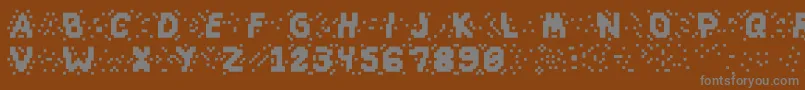 Шрифт Slapandcrumblyal – серые шрифты на коричневом фоне