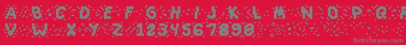 Slapandcrumblyal-fontti – harmaat kirjasimet punaisella taustalla