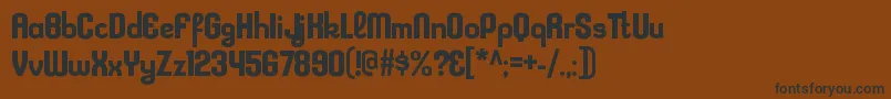 KleptocracyrgBold Font – Black Fonts on Brown Background