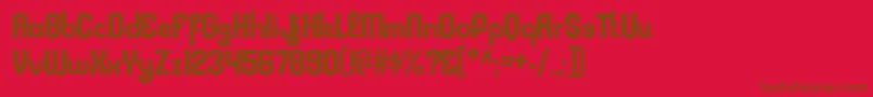 Czcionka KleptocracyrgBold – brązowe czcionki na czerwonym tle
