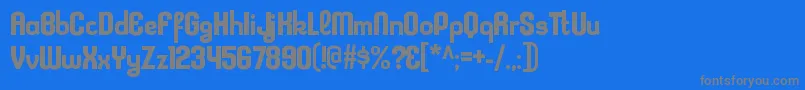 KleptocracyrgBold-fontti – harmaat kirjasimet sinisellä taustalla