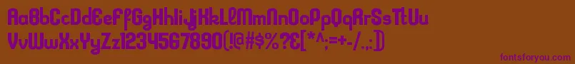 KleptocracyrgBold-fontti – violetit fontit ruskealla taustalla