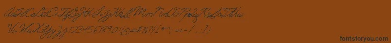 Więcej informacji o czcionce Erics Czcionka Erics – czarne czcionki na brązowym tle