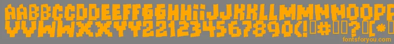 Freaks Of Nature Massive-Schriftart – Orangefarbene Schriften auf grauem Hintergrund
