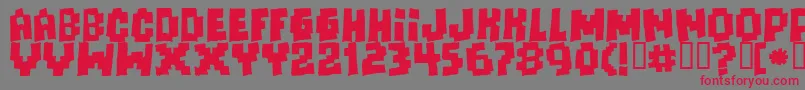Freaks Of Nature Massive Font – Red Fonts on Gray Background