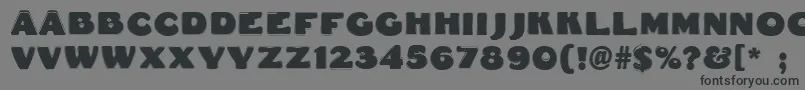 フォントFatfreddiecontour – 黒い文字の灰色の背景