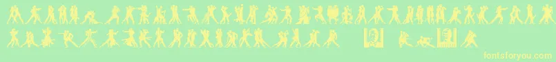 フォントTangomaniacsLtNight – 黄色の文字が緑の背景にあります
