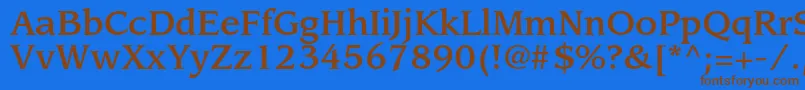 フォントLeawoodstdMedium – 茶色の文字が青い背景にあります。