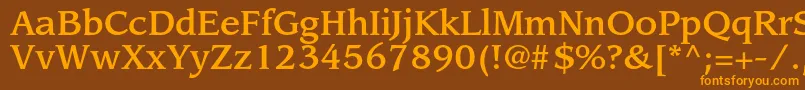 フォントLeawoodstdMedium – オレンジ色の文字が茶色の背景にあります。