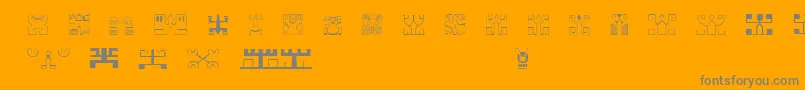 PolynesienEtuaFont-Schriftart – Graue Schriften auf orangefarbenem Hintergrund