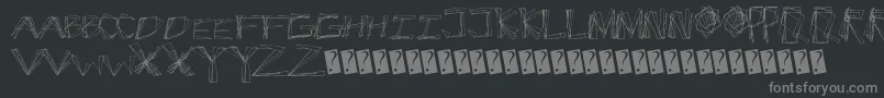 フォントCracksnacks – 黒い背景に灰色の文字
