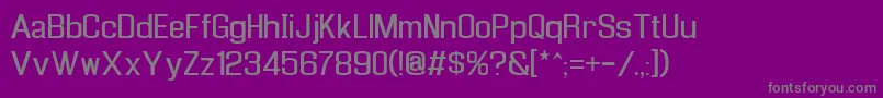 Enigrg-fontti – harmaat kirjasimet violetilla taustalla
