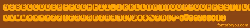 Monofett Font – Orange Fonts on Brown Background