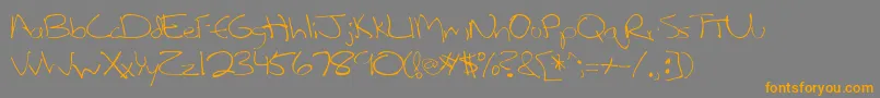 フォントLefty – オレンジの文字は灰色の背景にあります。