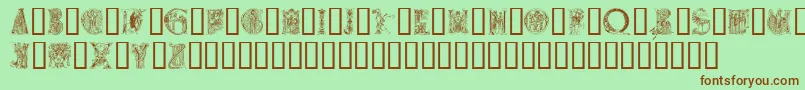 フォントMedievalalphabet – 緑の背景に茶色のフォント