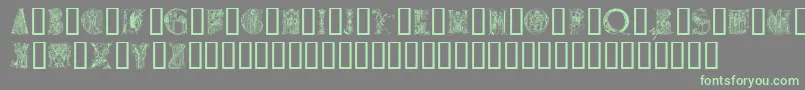 Medievalalphabet-fontti – vihreät fontit harmaalla taustalla