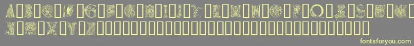 Medievalalphabet Font – Yellow Fonts on Gray Background