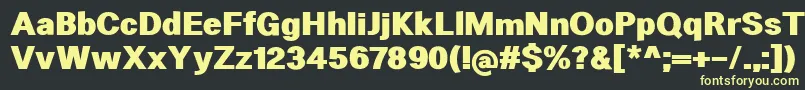 フォントHeltarHeavy – 黒い背景に黄色の文字