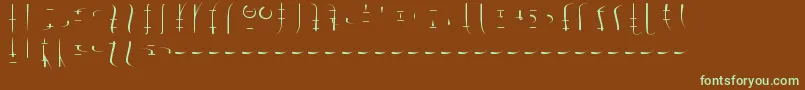 フォントLswDrachenklaueSamys0.1 – 緑色の文字が茶色の背景にあります。